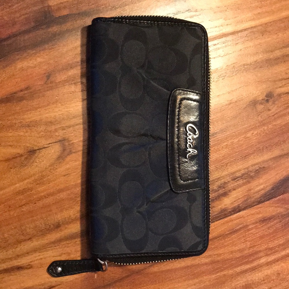 Black accordion Coach wallet